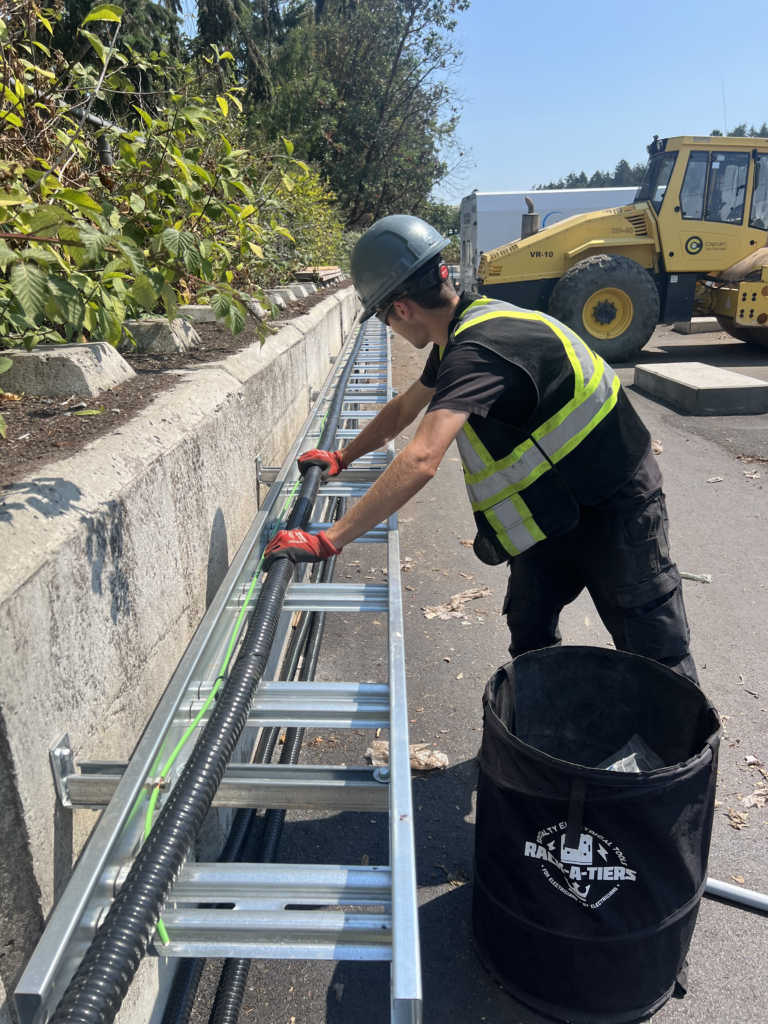 installing cable in new cable tray at convertus nanaimo